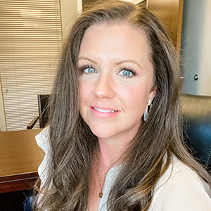 Leslie Goodwin smiling, professional headshot for Preferred Rate.
