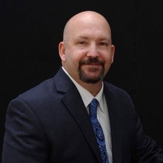 Professional headshot of David Geiger for Preferred Rate branding.