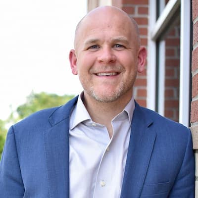 Professional portrait of Clint Haynes, financial expert at Preferred Rate.