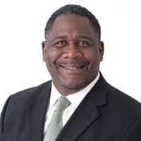 Preferred Rate financial advisor smiling in a suit.