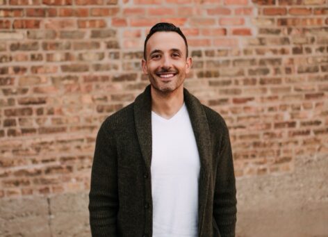 Business professional smiling for a portrait.
