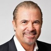 Professional portrait of Rich Atkinson, financial expert at Preferred Rate.