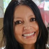 Cindy Cunningham smiling, promoting Preferred Rate mortgage services.