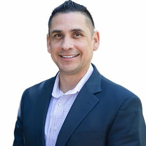 Professional portrait of Martin Yataco, representing expertise in financial services at Preferred Ra.
