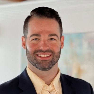 Professional portrait of Julian Christopher Russell, financial expert at Preferred Rate.
