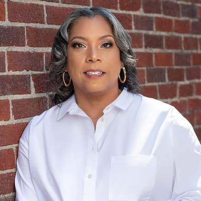 Esther McCowan portrait for financial services and loan options.