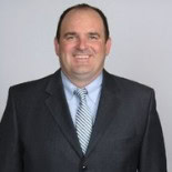 Professional portrait of Brett Hewlett for Preferred Rate.