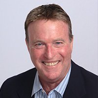 Michael H. Reddy smiling at Preferred Rate conference.