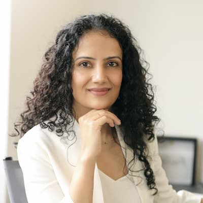 Portrait of a confident woman representing Preferred Rate services.