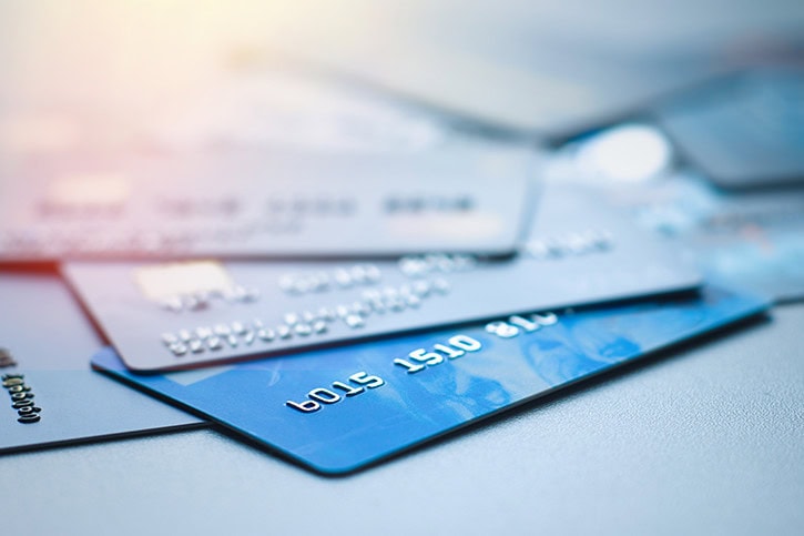 Credit cards stacked for debt repayment, financial management, and payment options.