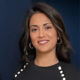 Hema Patel smiling at Preferred Rate, showcasing professional financial services.