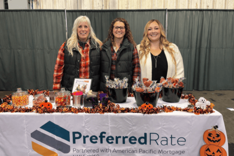 Preferred Rate team at Halloween event promoting mortgage services.