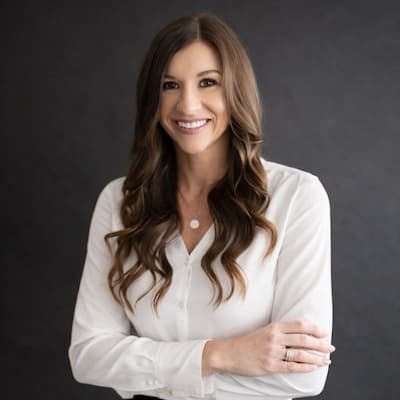 Ashley Nicole Barrett smiling portrait for Preferred Rate.