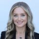 Nicole Dodd smiling, professional headshot for financial services.