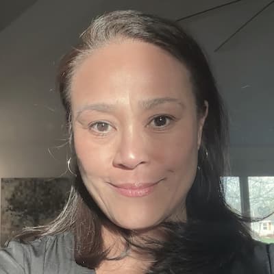 Maria E. Wirth smiling portrait for financial services.