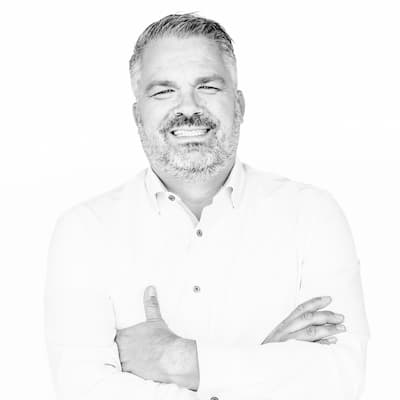Andy Nester smiling confidently, representing Preferred Rate financial services.