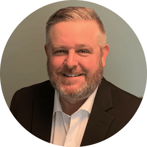 Shawn Hartman smiling, professional headshot for Preferred Rate.
