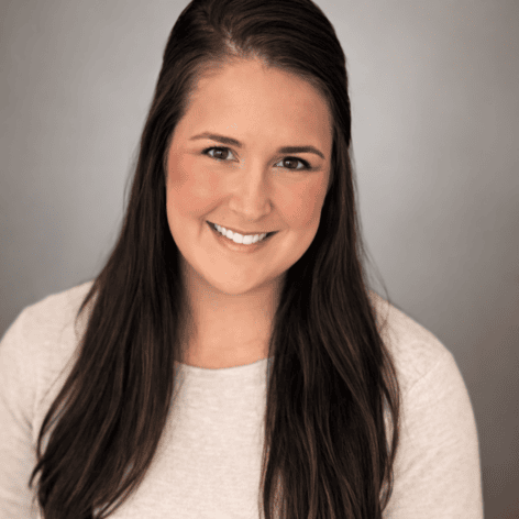 Portrait of Samantha Stroot, financial expert at Preferred Rate, smiling confidently.